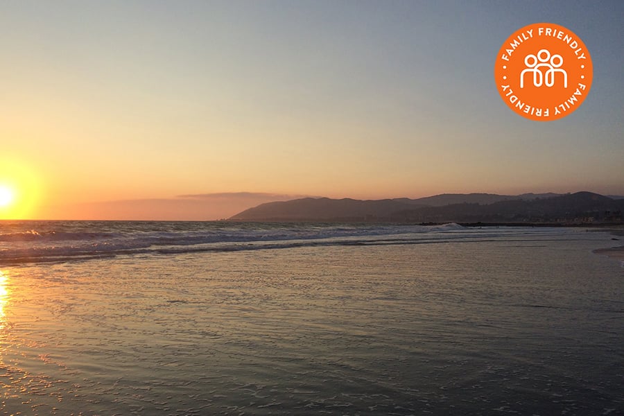 Sunset over the ocean at Oxnard State Beach.  Image is stamped with a Family Friendly Badge.