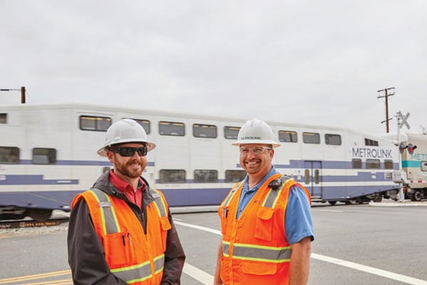 Metrolink employees wearing hard-hat safety gear
