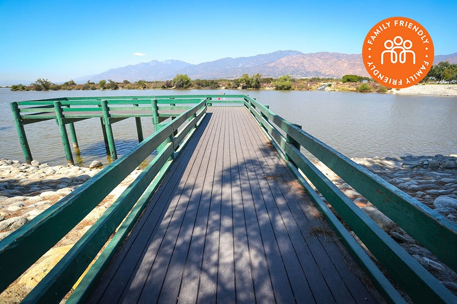 Pier at the lake at the Santa Fe Recreation Area. Image stamped with Family Friendly Badge.